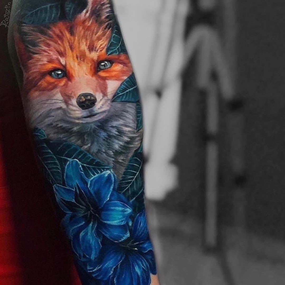 a woman with a cover-up tattoo of a fox and flowers, bergstraße, germany