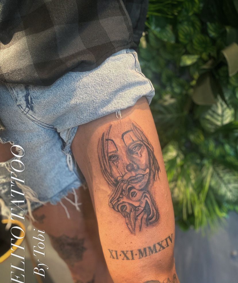 a cover-up tattoo of a woman with a dragon on her arm, aichach-friedberg, germany