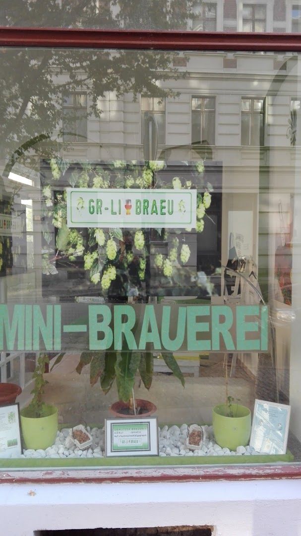 a window with a sign that says mini - brae