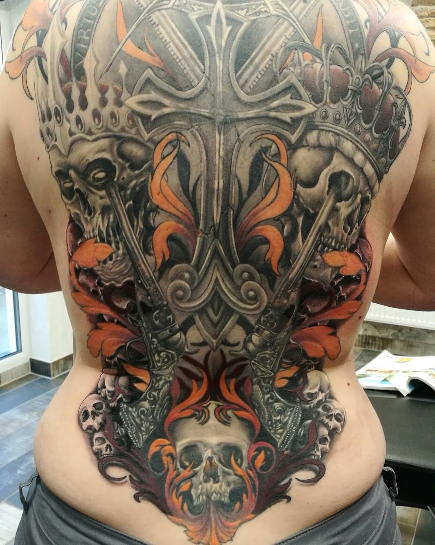 a man with a back cover-up tattoo of skulls and skulls, barnim, germany