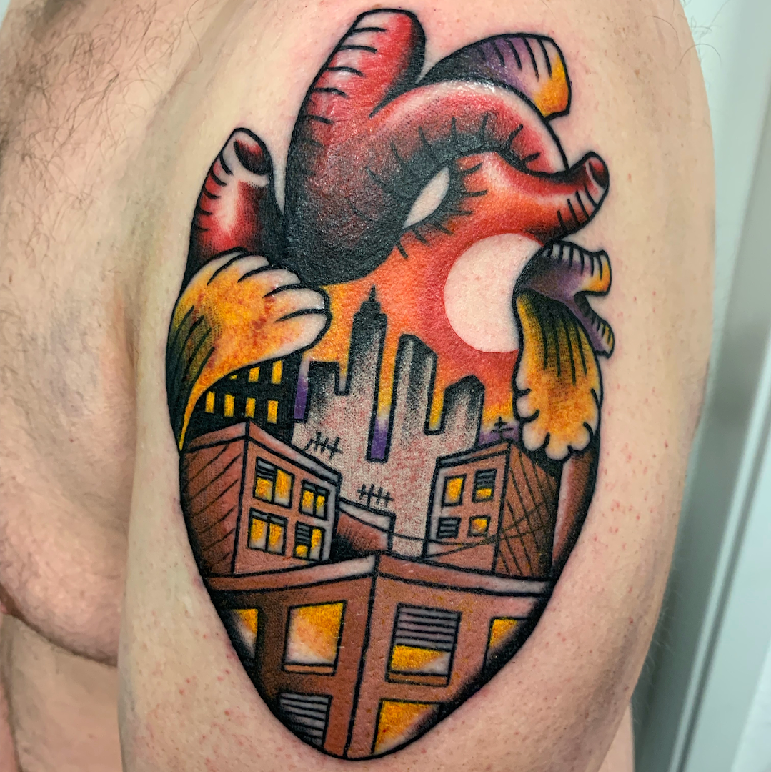 a japanische tattoos in leipzig of a heart with a city in the background, tuttlingen, germany