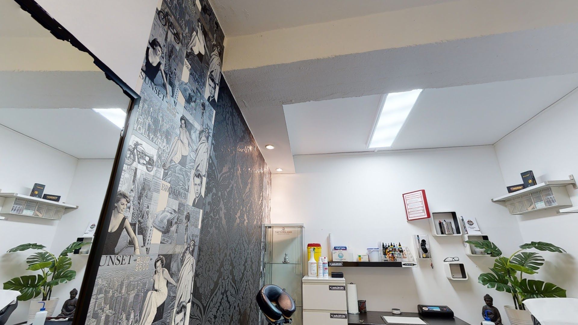 a large mural in a room with a wall