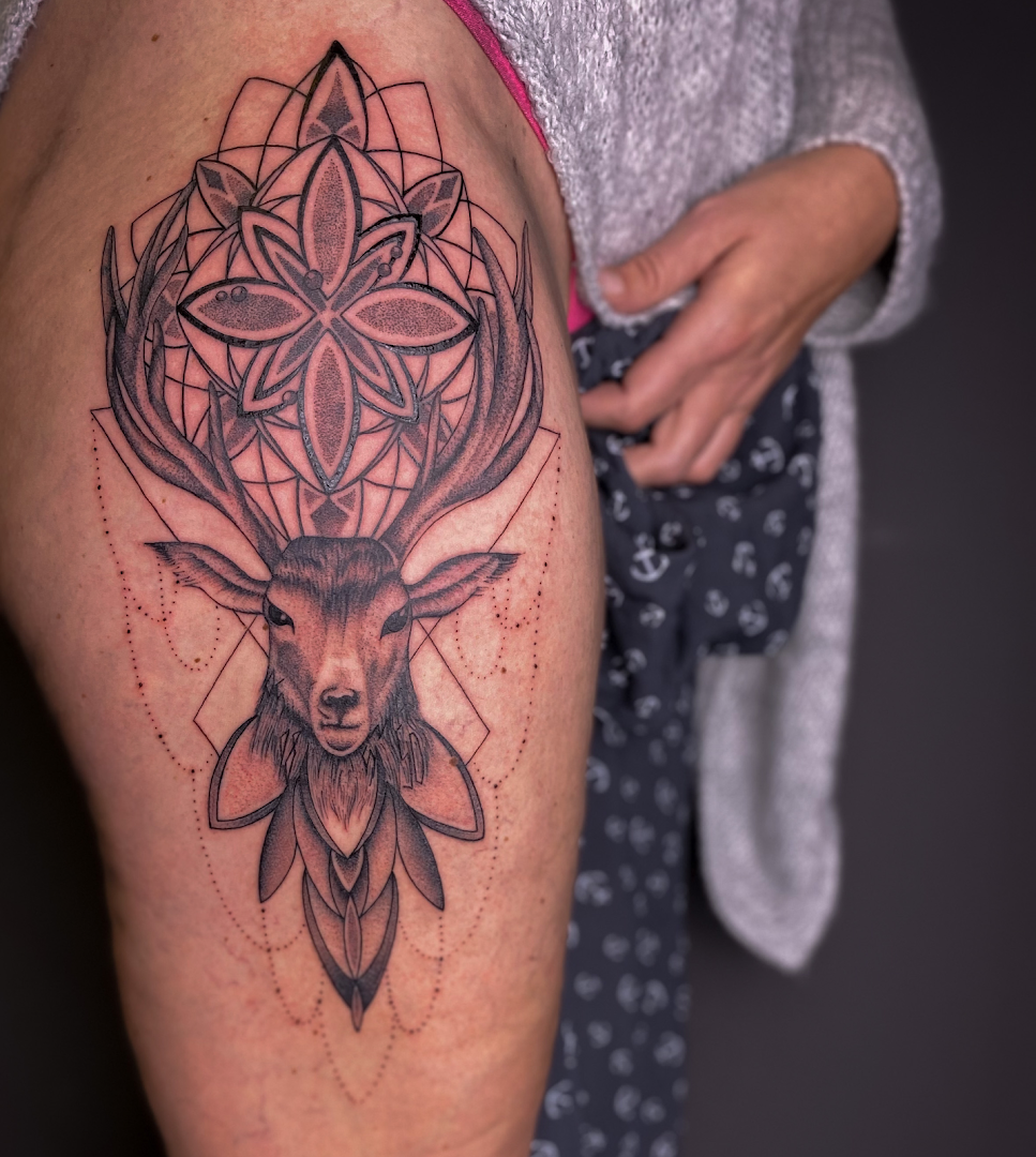 a woman with a narben tattoo on her thigh, schwalm-eder-kreis, germany