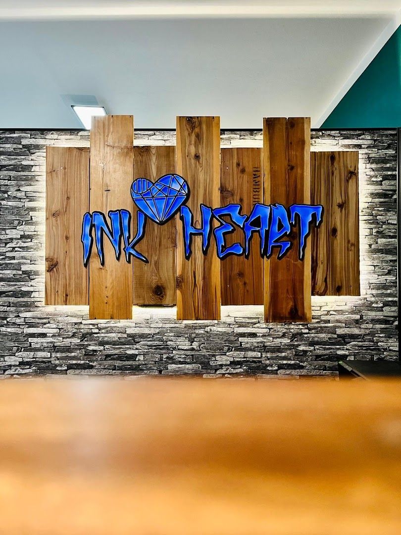 a wooden wall with graffiti on it