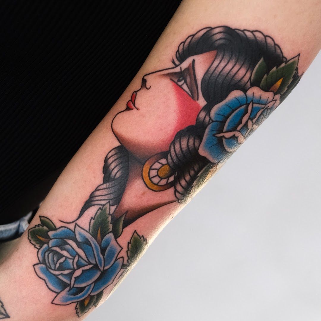 a woman's arm with a cover-up tattoo design on it, berlin, germany