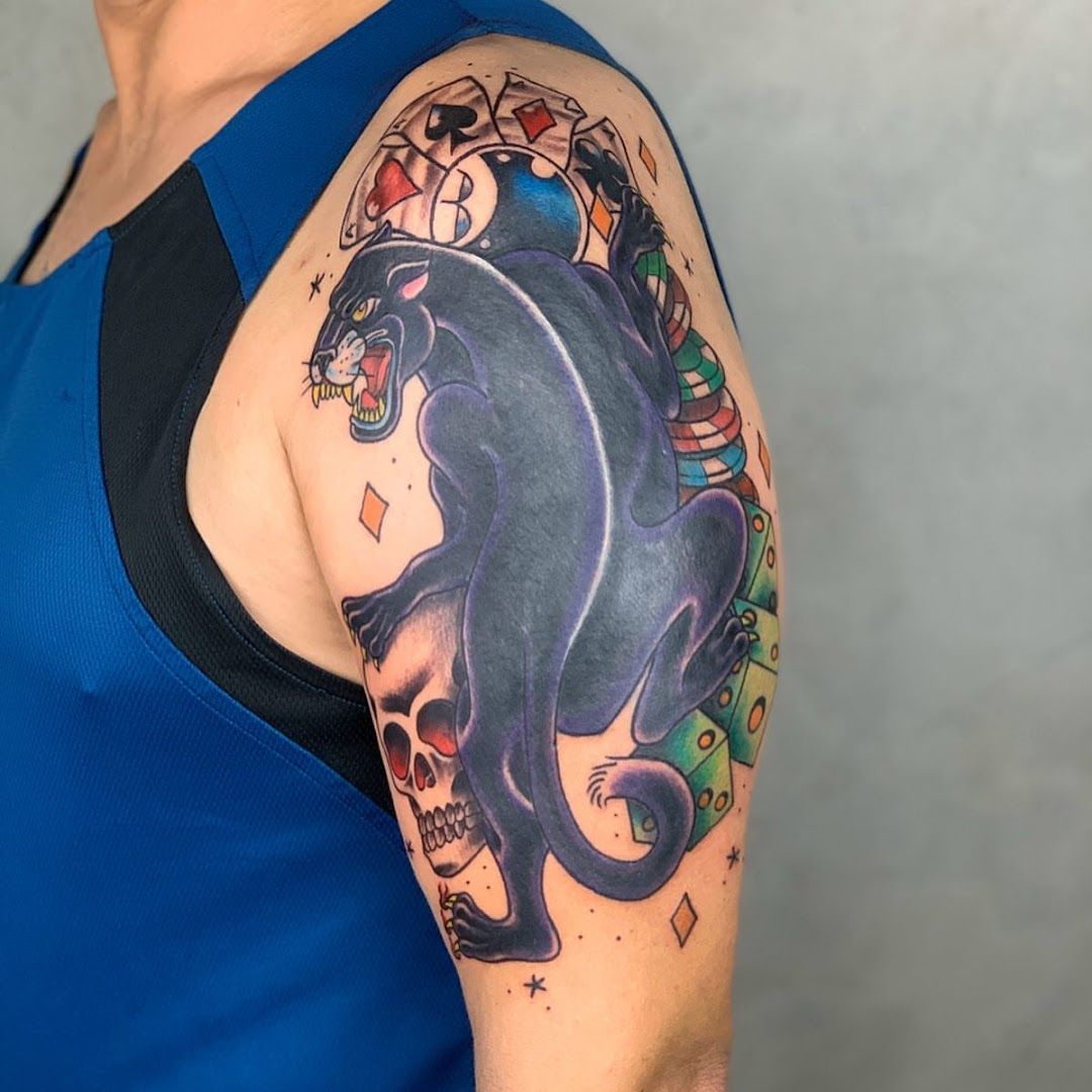 a narben tattoo of a black panther with a skull and a skull, bonn, germany
