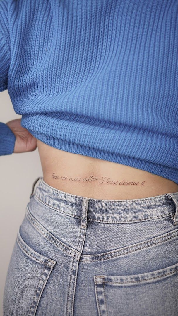 a woman with a narben tattoo on her stomach, berlin, germany