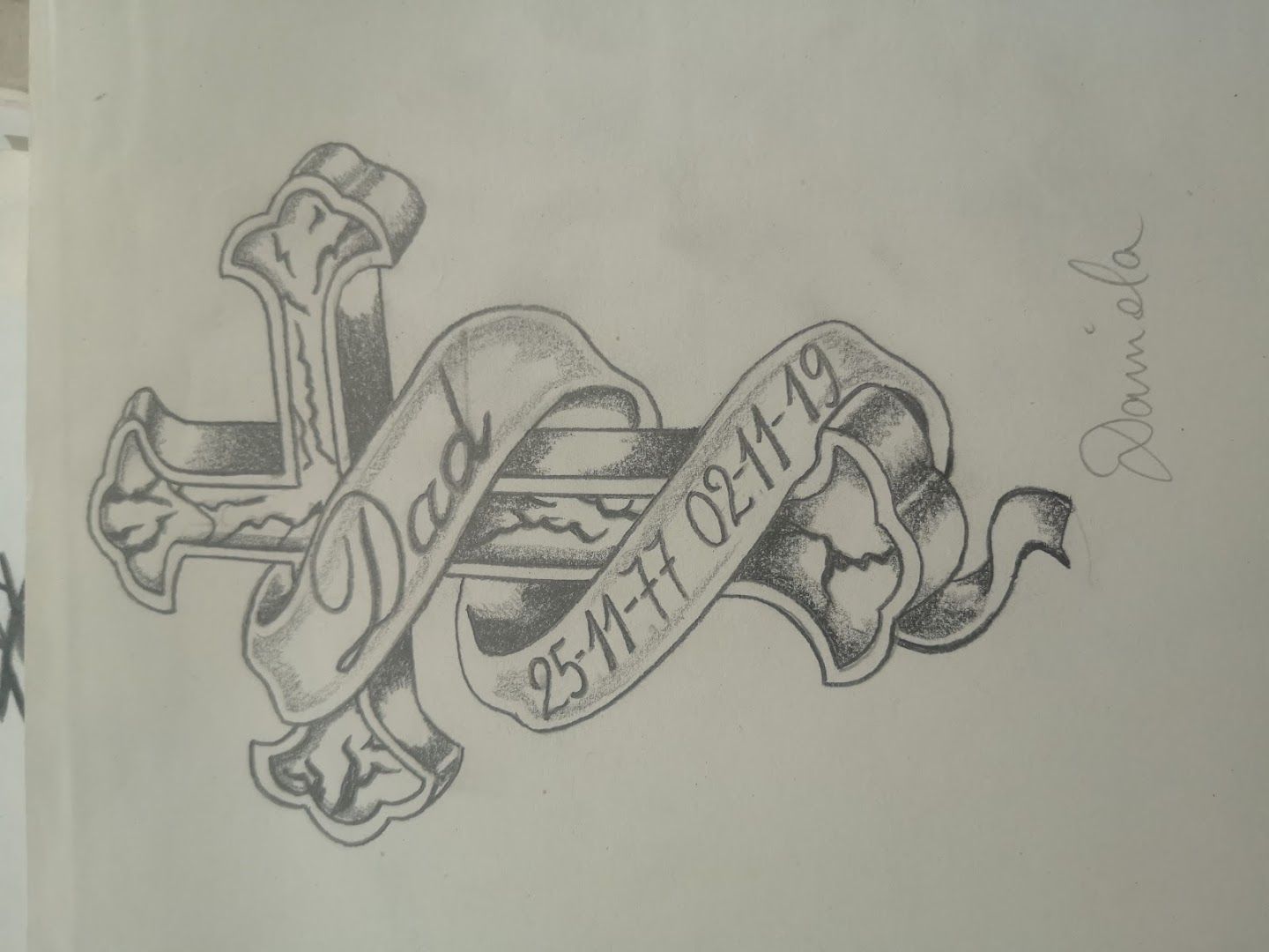 a drawing of a cross and a cross with the word love