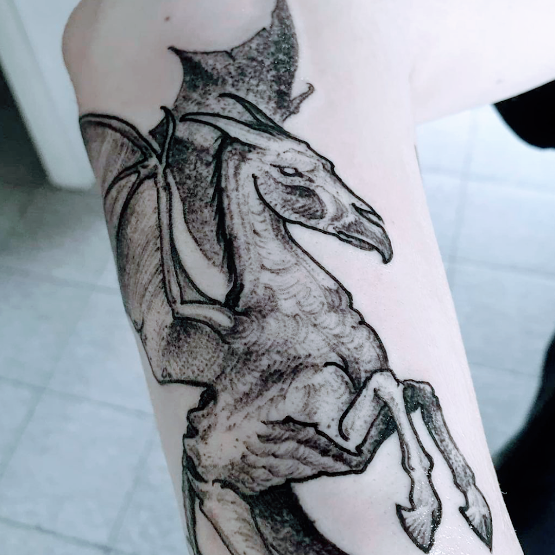 a narben tattoo of a horse and rider on the arm, frankfurt, germany