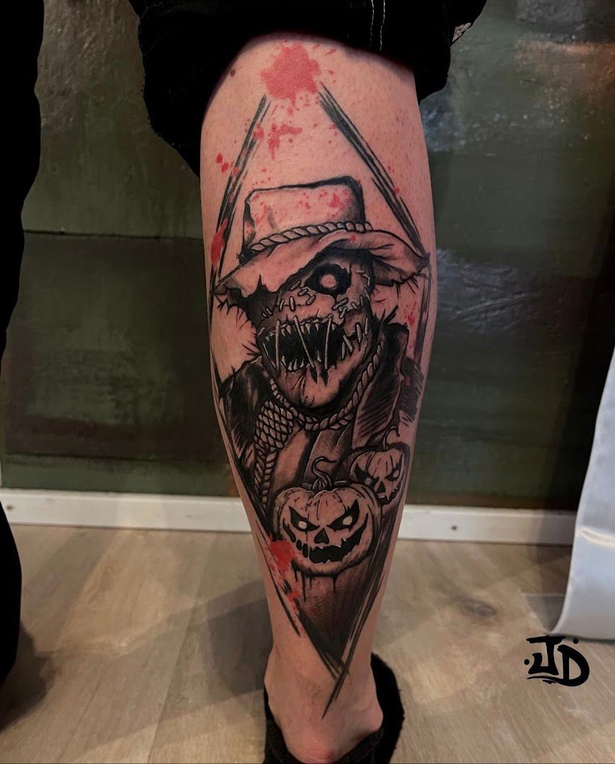a cover-up tattoo of a dragon on the leg, biberach, germany