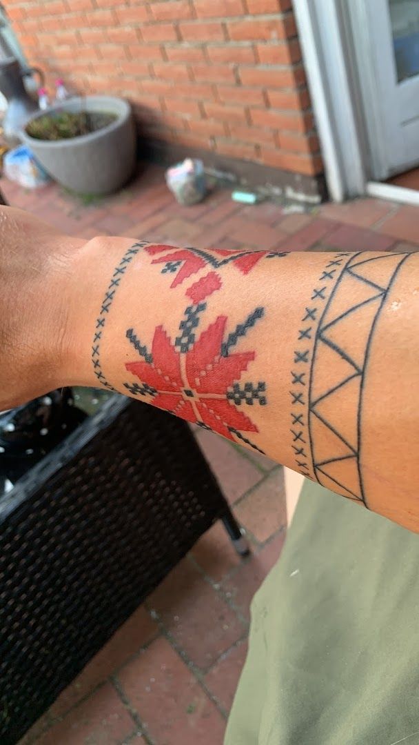 a man with a japanische tattoos in leipzig on his arm, rhein-sieg-kreis, germany