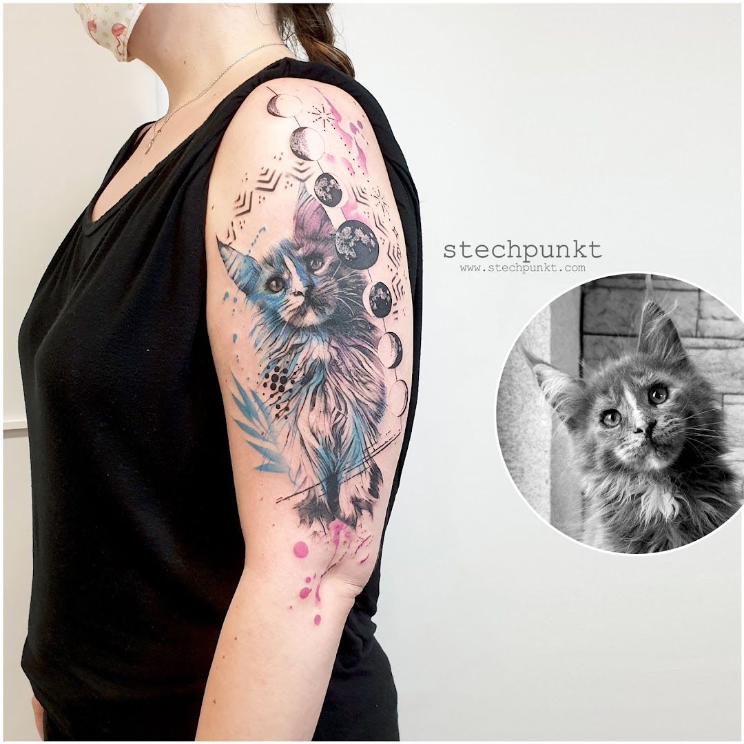 a woman with a cat narben tattoo on her arm, zwickau, germany