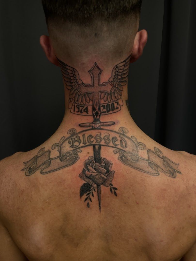 a man with a narben tattoo on his back, rhein-erft district, germany