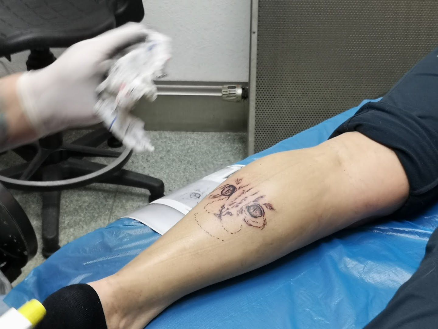 a person with a cover-up tattoo on their leg, kreisfreie stadt heilbronn, germany