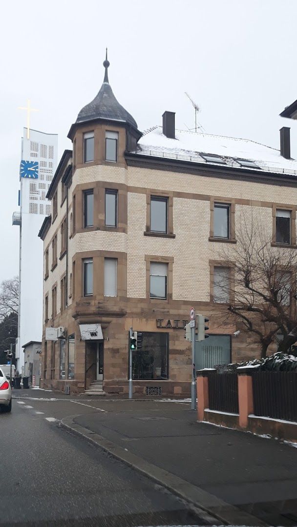 a building with a car parked in front of it