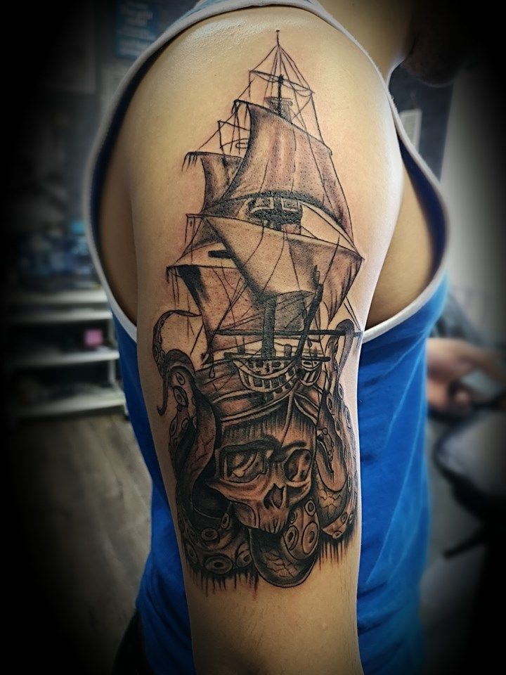 a cover-up tattoo of a ship with a skull on it, neustadt (aisch)-bad windsheim, germany