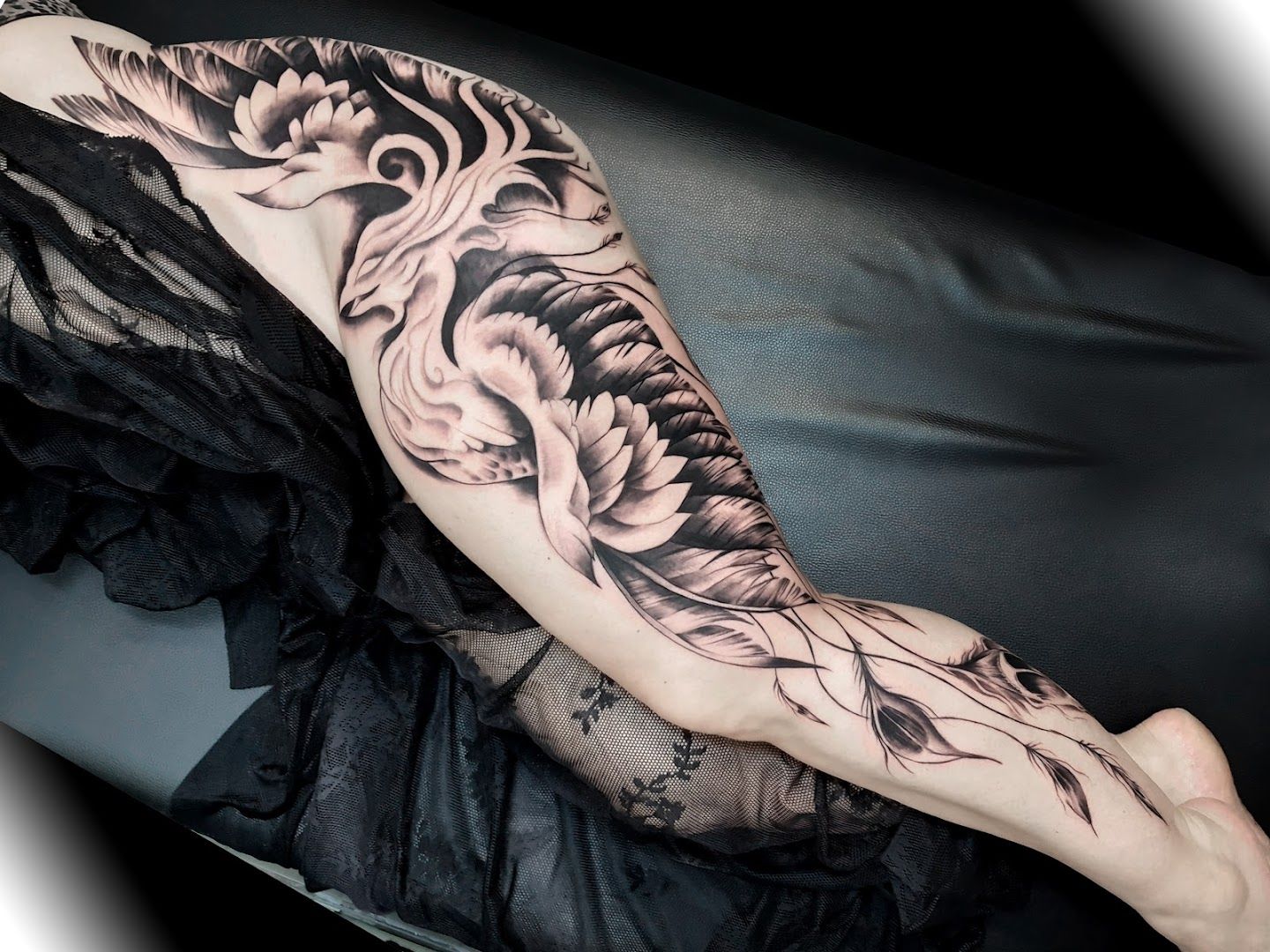 a woman's arm with a black and white cover-up tattoo, aichach-friedberg, germany