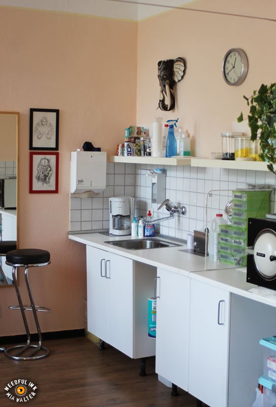 a kitchen with a sink and a counter