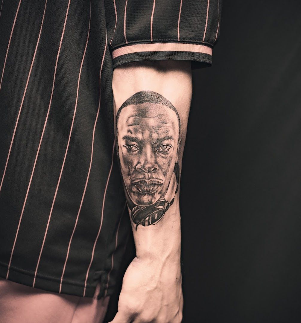 a man with a cover-up tattoo on his arm, bad kreuznach, germany