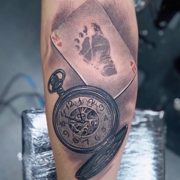 a narben tattoo with a pocket watch and a pocket watch, bodenseekreis, germany