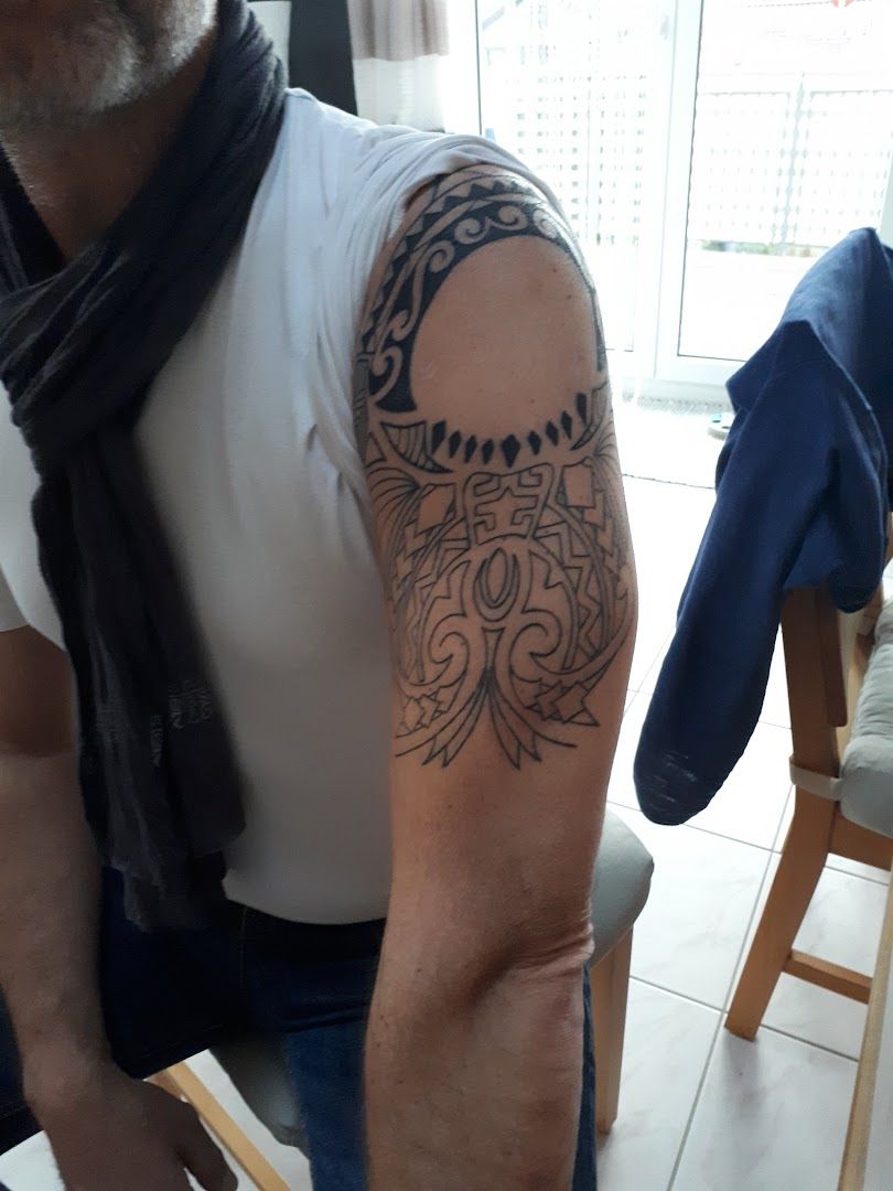 a man with a narben tattoo on his arm, darmstadt-dieburg, germany