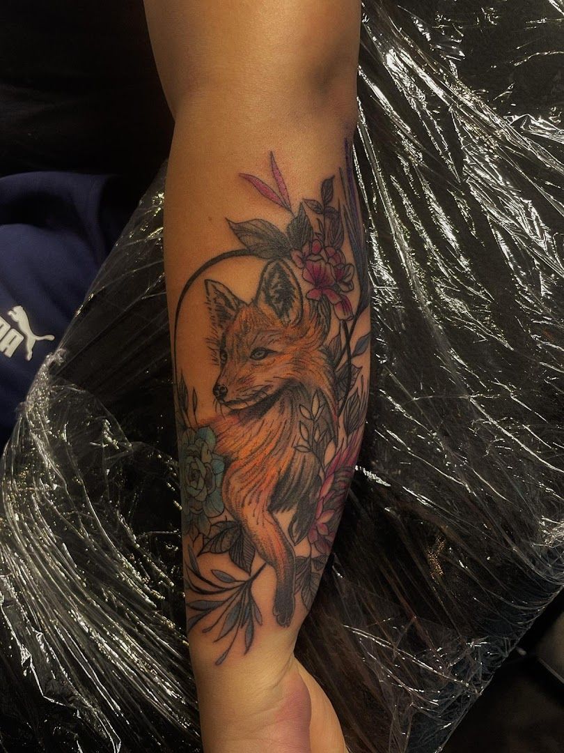 a woman with a narben tattoo on her arm, berlin, germany