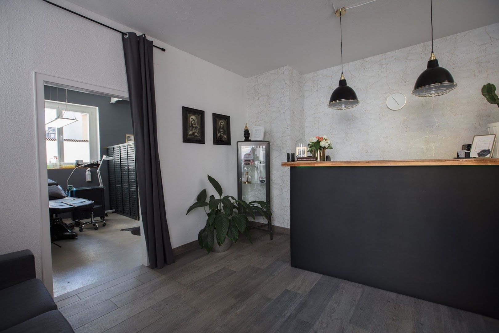 a black and white office with a wooden counter