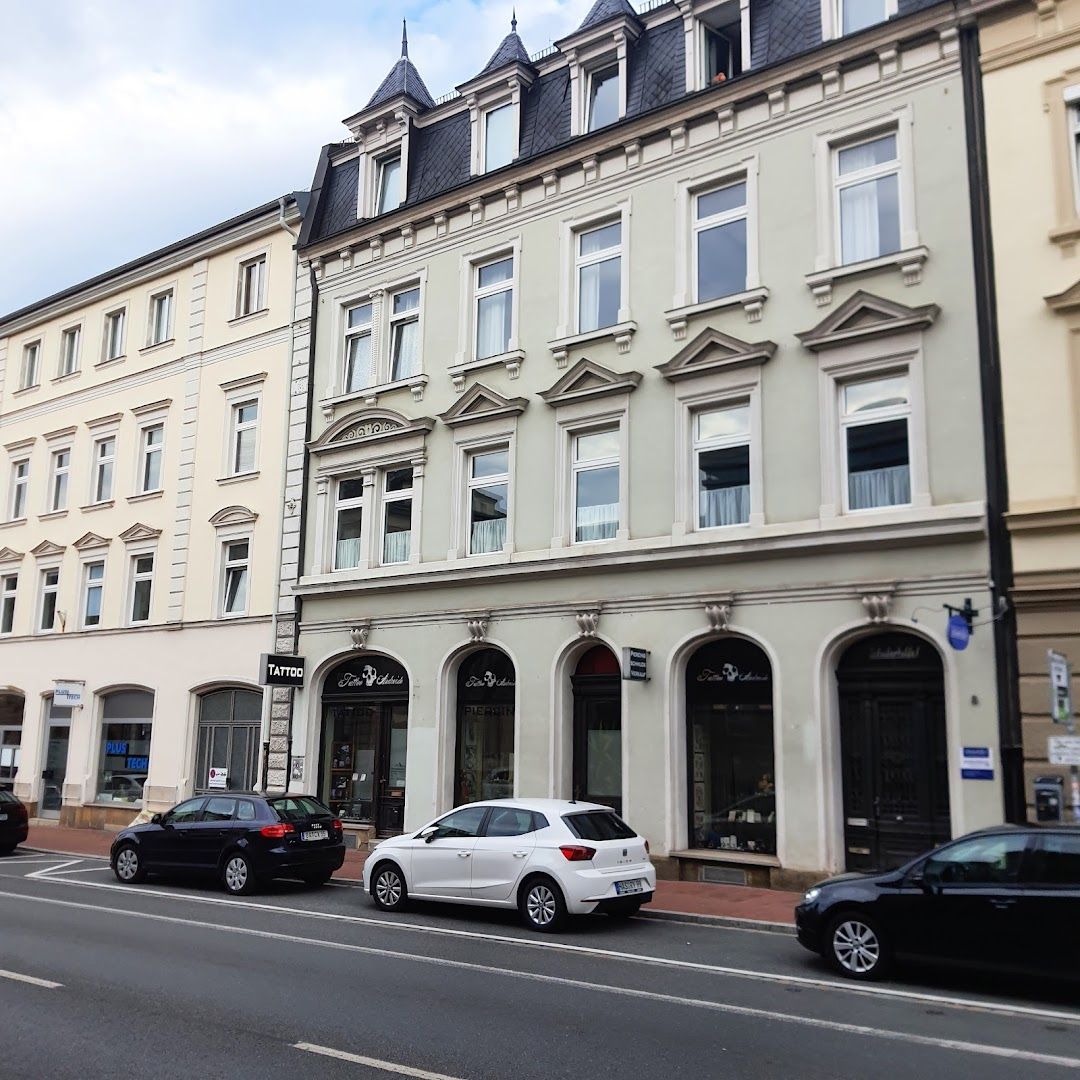 a row of buildings on a street in a city