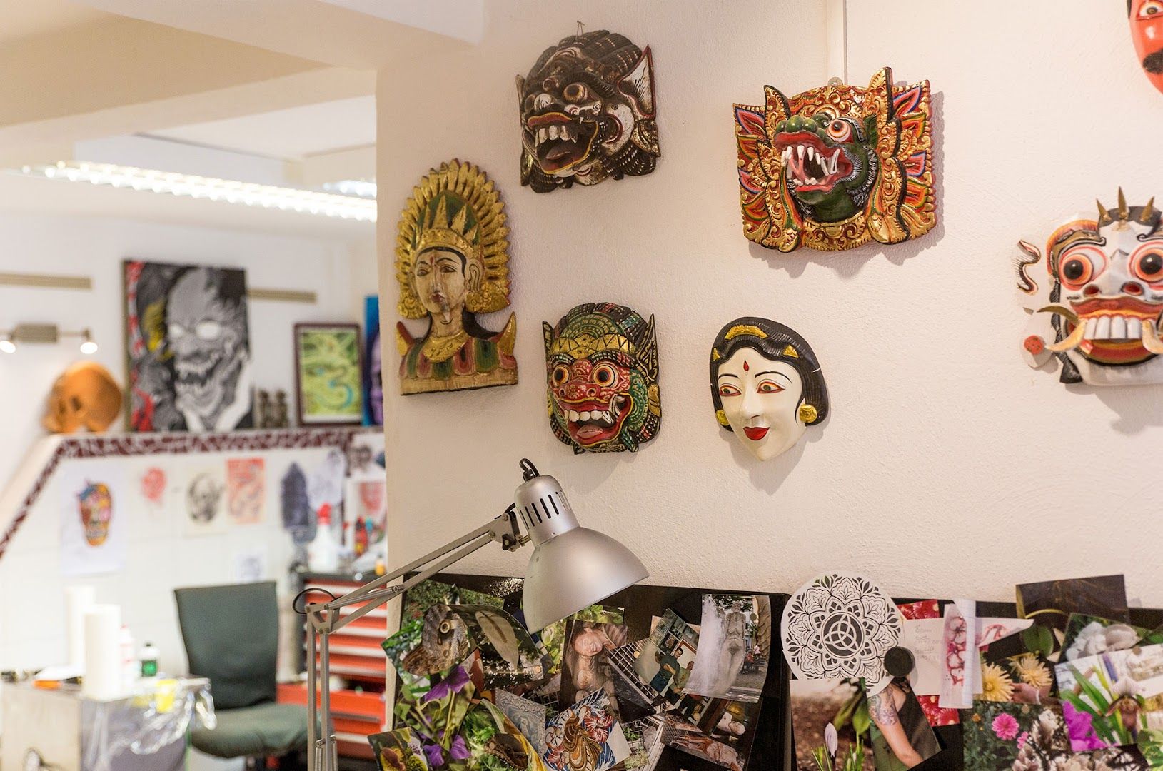 a wall with many masks on it