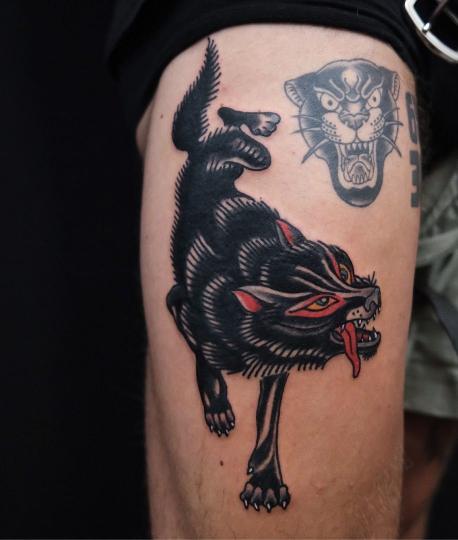 a narben tattoo of a wolf with a skull on it, berlin, germany