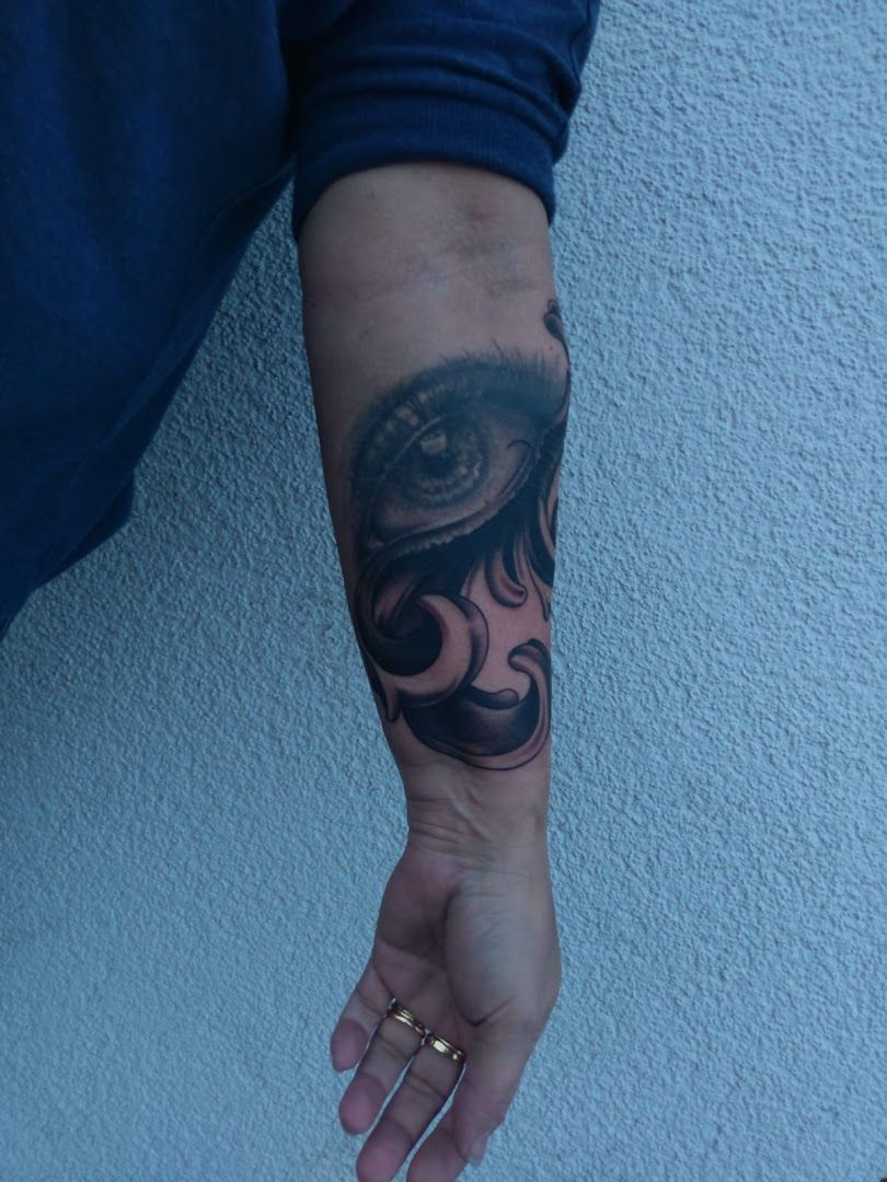 a man with a cover-up tattoo on his arm, darmstadt-dieburg, germany