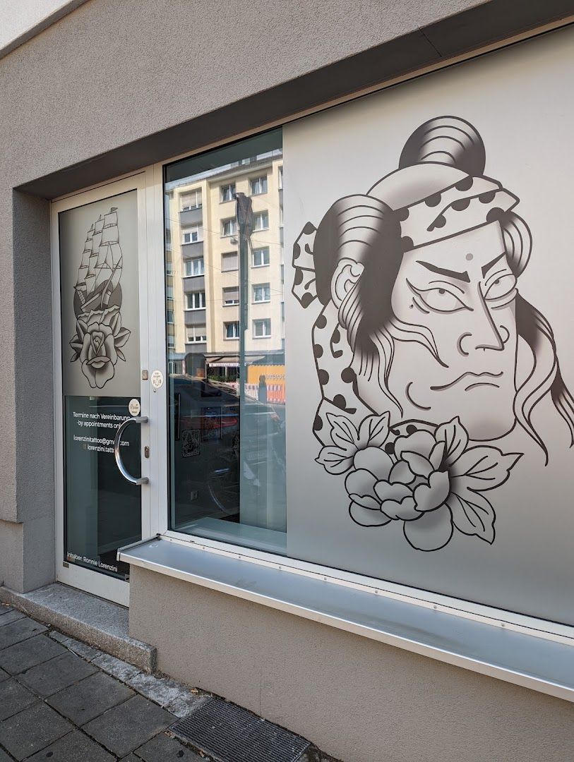 a window with a drawing of a woman in the window