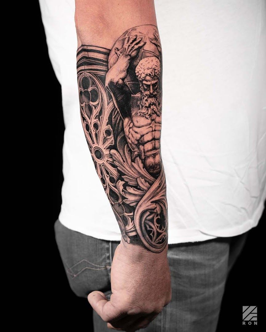 a man with a cover-up tattoo on his arm, ahrweiler, germany