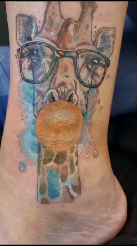 a cover-up tattoo of a gi with glasses on it, berlin, germany