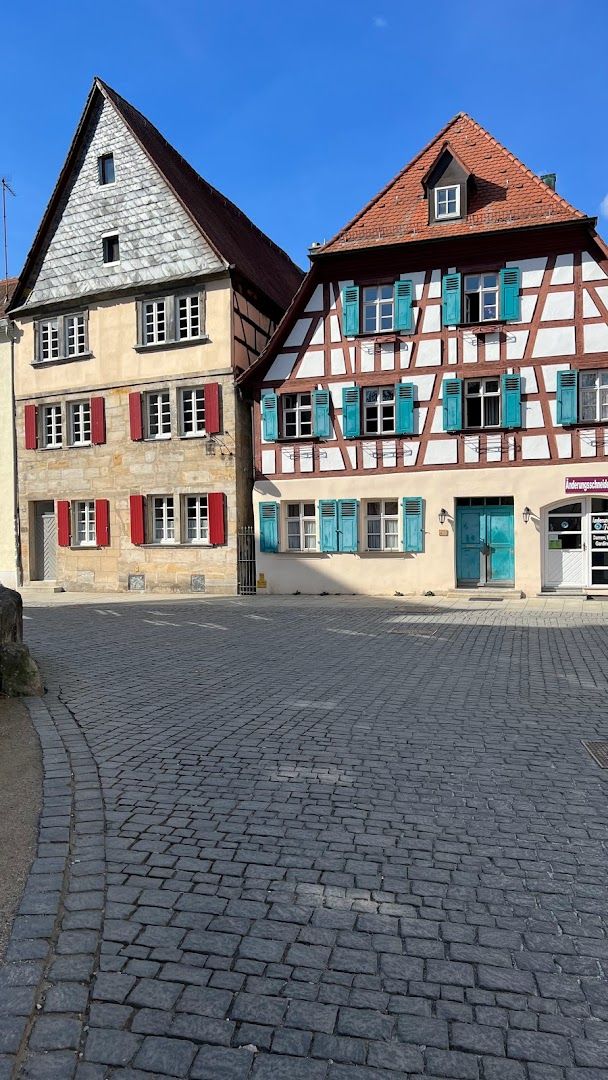 a cobbed street in the village of saint - etienne