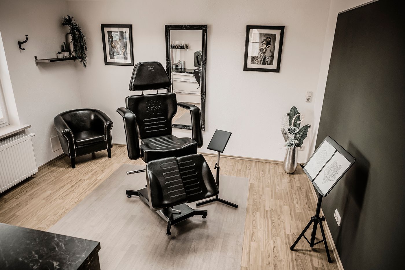 a salon room with chairs and mirrors