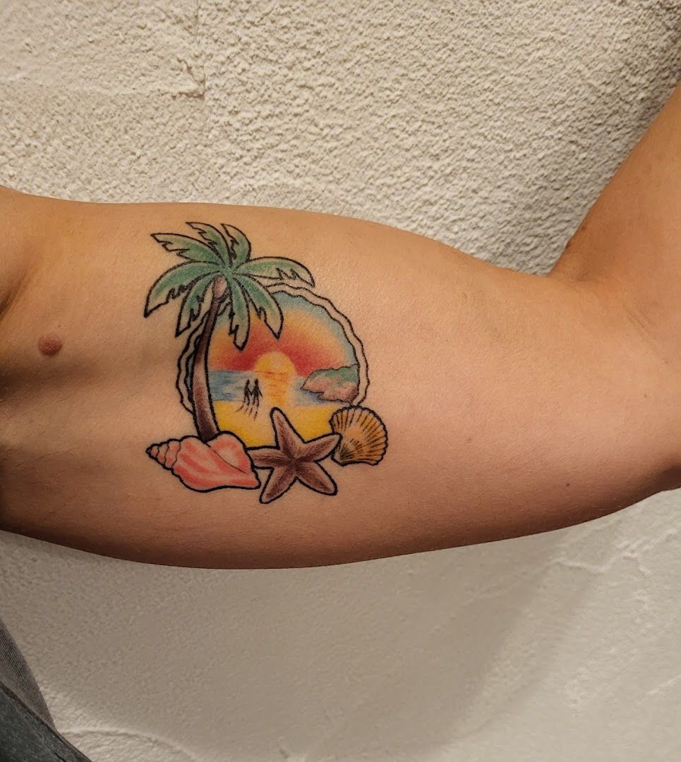 a cover-up tattoo of a palm tree and a starfish, alzey-worms, germany