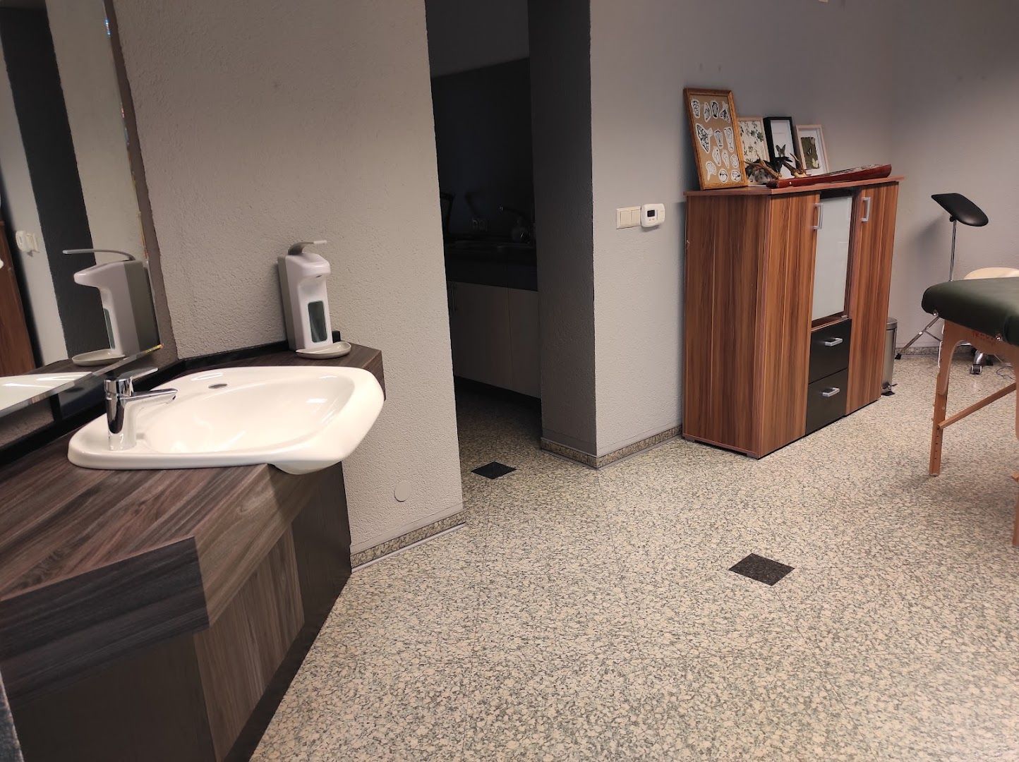 a bathroom with a sink and a mirror