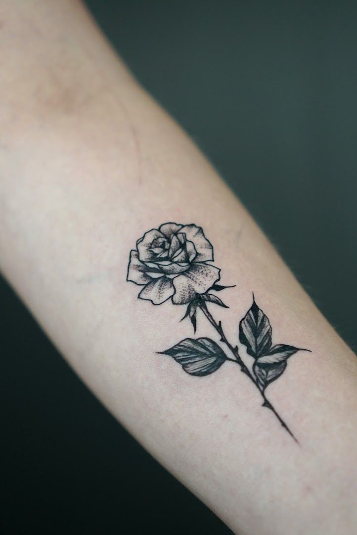 a rose cover-up tattoo on the wrist, mönchengladbach, germany