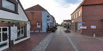 the street in front of the house is empty