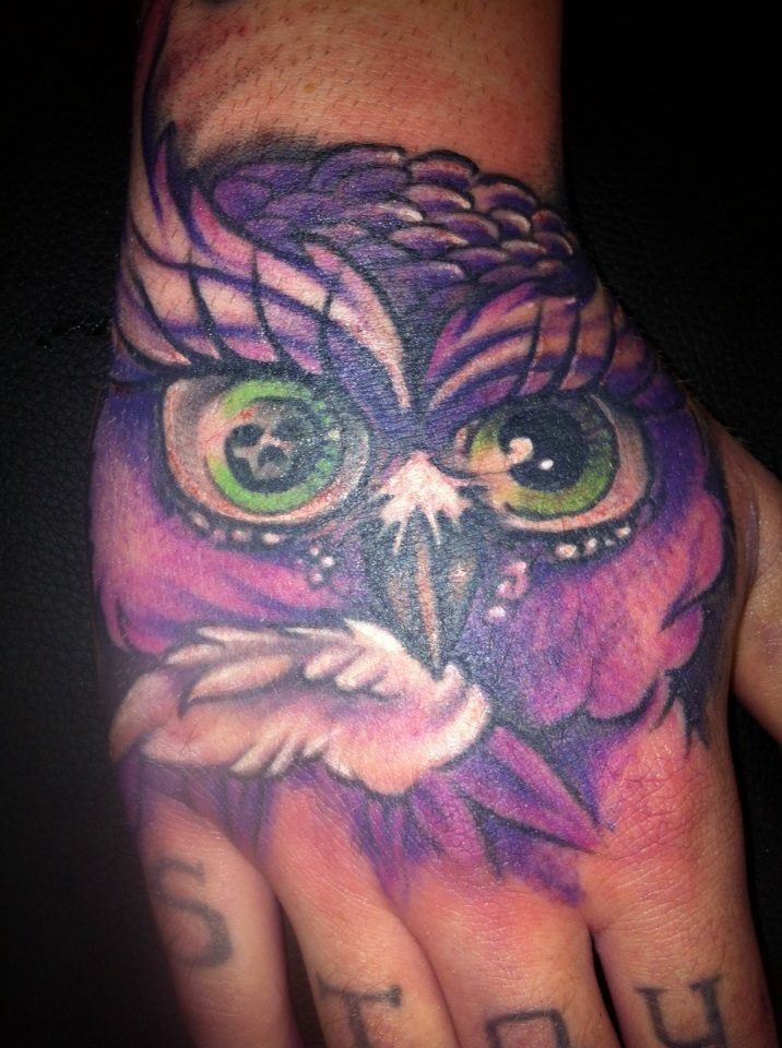 a hand with an owl japanische tattoos in leipzig on it, sächsische schweiz-osterzgebirge, germany