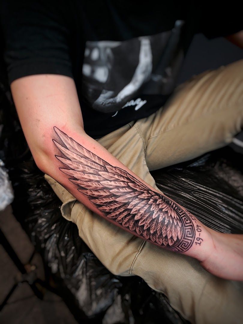 a man with a narben tattoo on his arm, dresden, germany