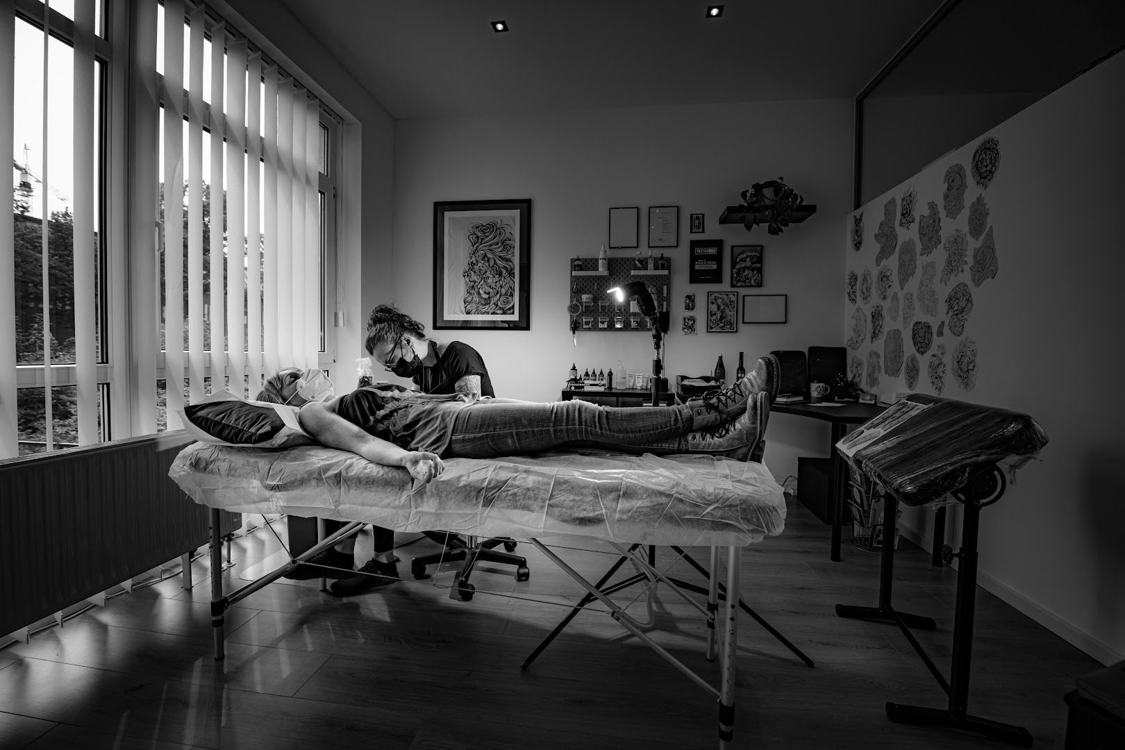 a woman laying on a bed in a room