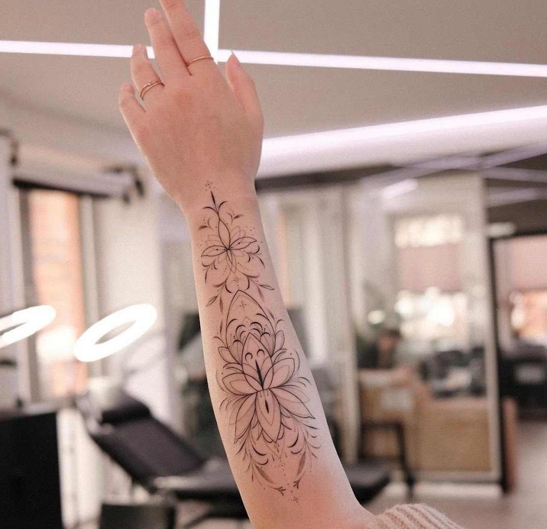 a woman's arm with a narben tattoo design on it, kassel, germany