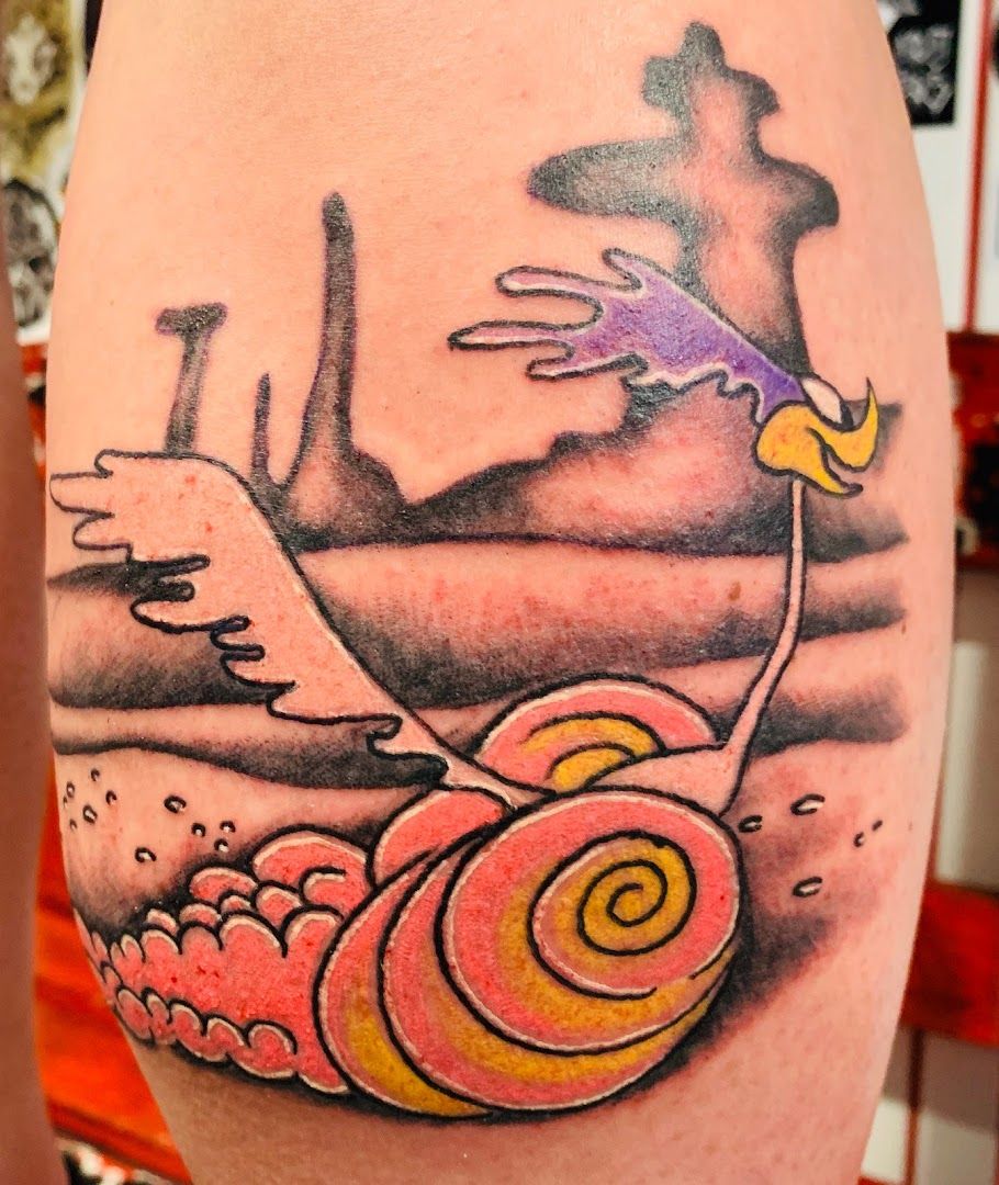 snail cover-up tattoo by mike, schwerin, germany