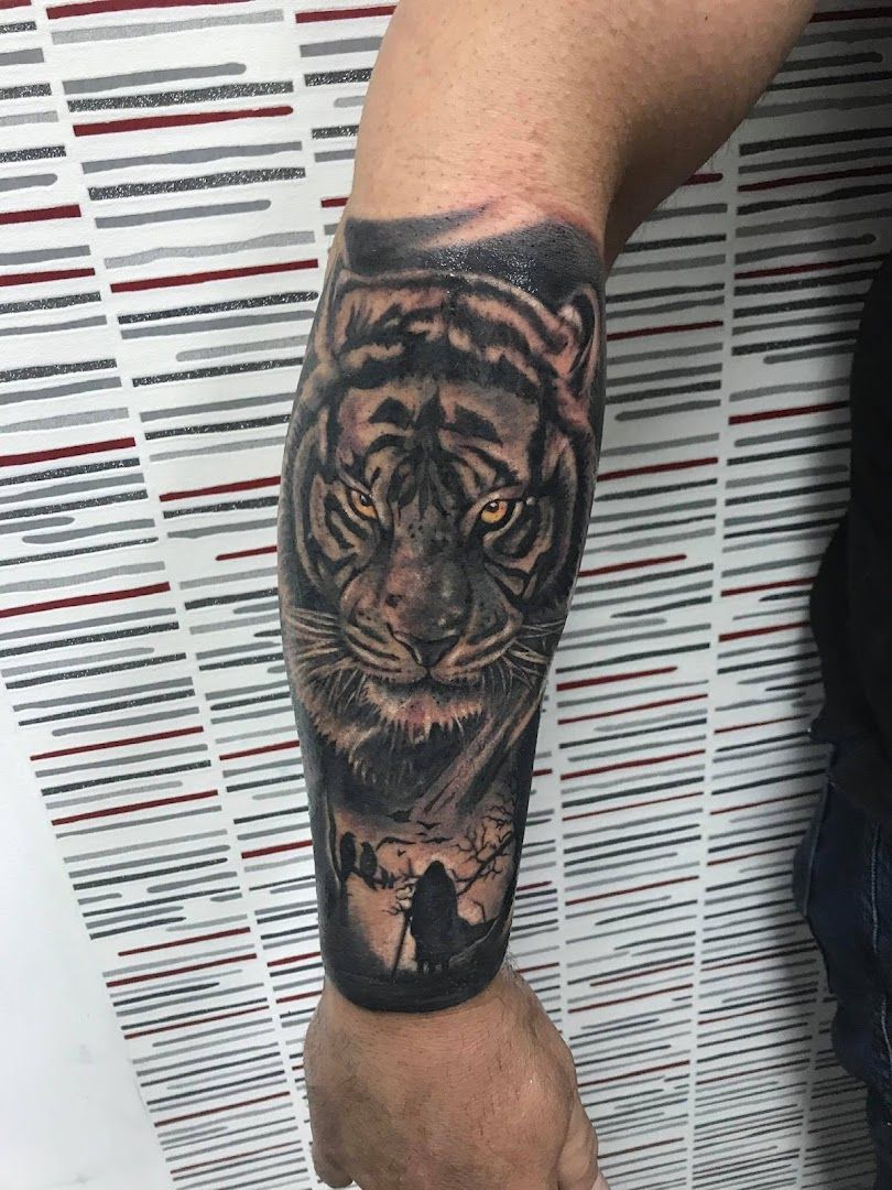 a tiger cover-up tattoo on the forearm, nürnberg, germany