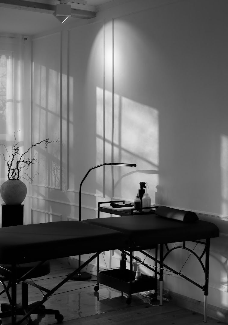 a black and white photo of a desk