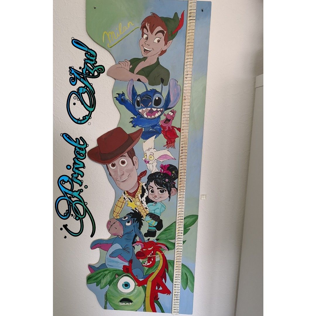 a tall ruler with the characters of disney and the princesses