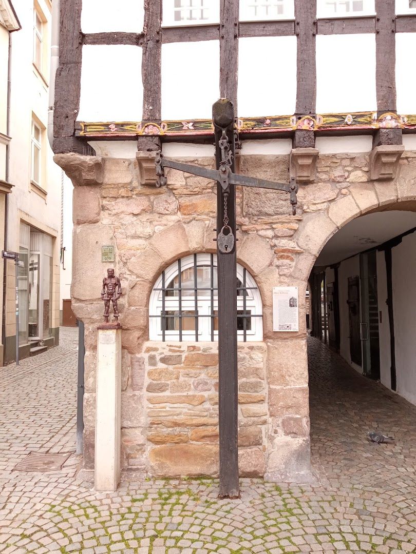 a building with a cross on the front