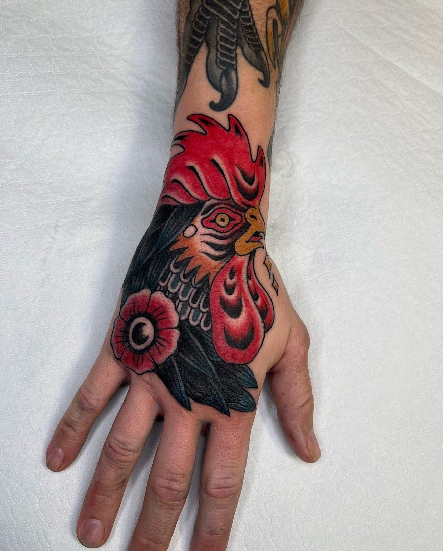 a rooster narben tattoo on the hand, gütersloh, germany